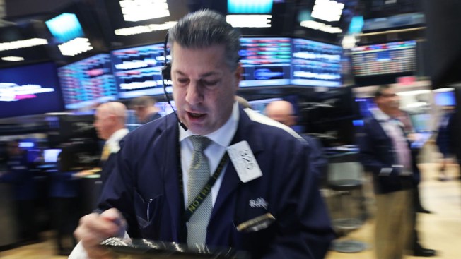 Wall St sinks on Trump