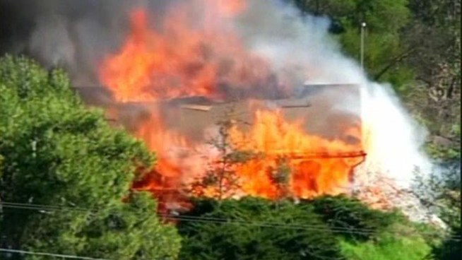 One year later, there is actually a silver lining for at least three neighbors of the so-called bomb house.