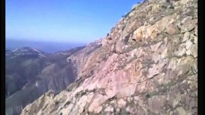 Two hikers were pulled to safety Sunday from a point 2600 feet up on El Cajon Mountain near the El Capitan reservoir. Video provided by the San Diego County Sheriff's Department.
