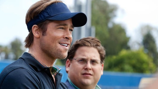 Brad Pitt chats with reporters at the Toronto Film Festival premiere of his baseball movie, 