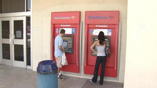 Blaming changing economics of offering debit cards, Bank of America will start charging customers who use debit cards for purchases a $5 monthly fee starting in early 2012.