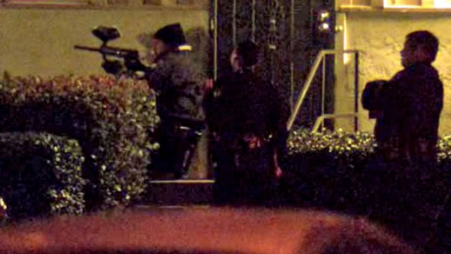 A man armed with two swords exited the apartment on Dominguez Way after a six-hour standoff with law enforcement officers. NBC 7's Brandi Powell reports.