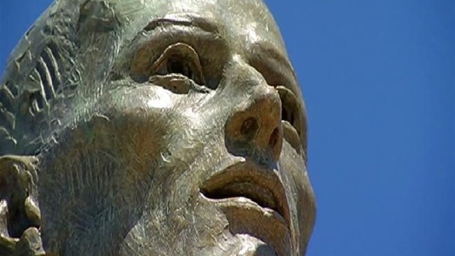 The Liberation Moment, created by sculptor Richard Becker, was designed to honors the sacrifice of veterans captured during America's wars. The American Ex-Prisoners of War (AXPOW) installed the monument to POWs near the entrance of the new cemetery off Nobel Drive.