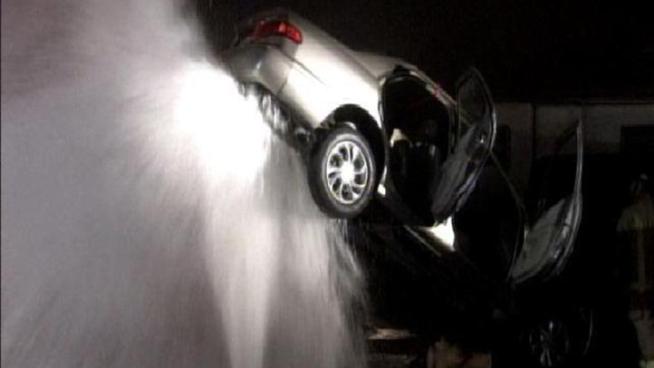Water flooded the intersection of Euclid and Lisa streets after the accident happened around 2:30 a.m. in Chollas View.
