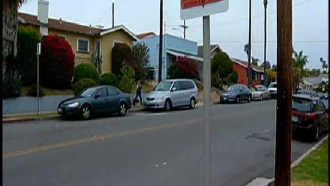 Two men told police they were sitting in their vehicle at the corner of Lincoln and Alabama in North Park around 1 a.m. when a stranger appeared at the driver's side window. Lt. David Rohowits spoke with NBC 7's Steven Luke in this report.