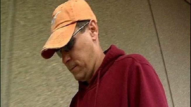 Kevin Alan Kenniston, 41, was arrested Monday for allegedly impersonating an officer. His defense attorney said the car painted to look like a police vehicle was necessary for Kenniston's job.