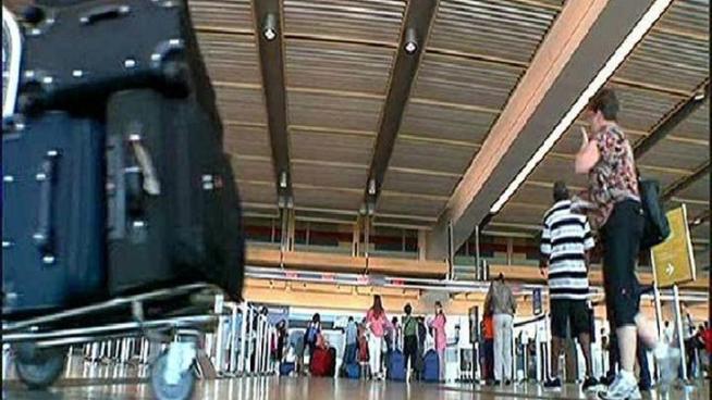 Rondell Holland was one of many frustrated passengers at the San Diego International Airport on Monday, trying to find a way home.