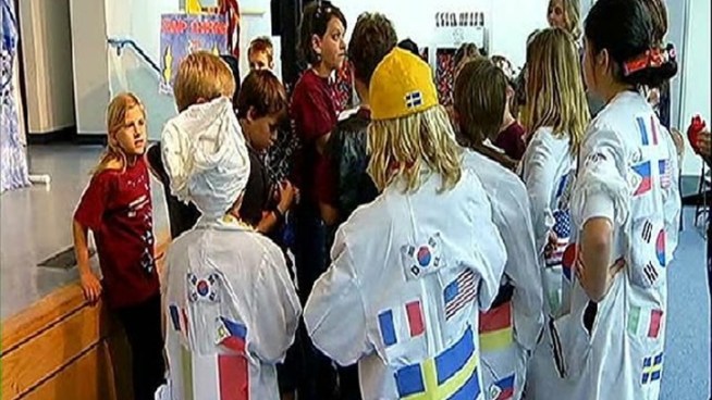An elementary school in Carlsbad has advanced to the statewide Odyssey of the Mind competition. Liam Neal and Sophie Park, participants in the event talk with their coach Tricia Demmet about moving to the next round.