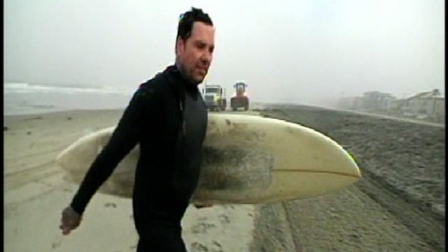 Along Mission Beach, an NBCSanDiego's news crew spotted one surfer catching some morning surf despite the advisory to stay out of the water.