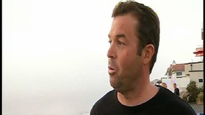 Brent Manion said he'll never forget the moment he saw the 10-foot shark circling around him and under his board. Nicole Gonzales reports.