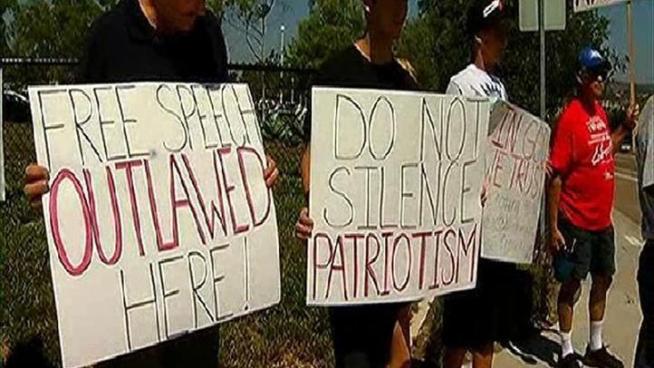 Parents and Tea Party activists stood outside Westview High School protested against a court ruling in which a teacher was told to take down a religious banner.