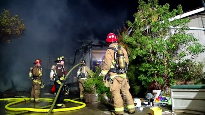 Neighbors in a La Jolla neighborhood talk to NBC 7 reporter Steven Luke about the frightening site of a late night fire.