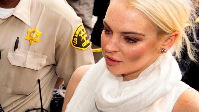 A judge revoked the probation of Lindsay Lohan Wednesday after the actress encountered problems during her community service assignment at a women's shelter.