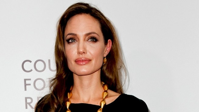 Angelina Jolie and Brad Pitt hit the red carpet for the premiere of Angelina's feature film directorial debut, 