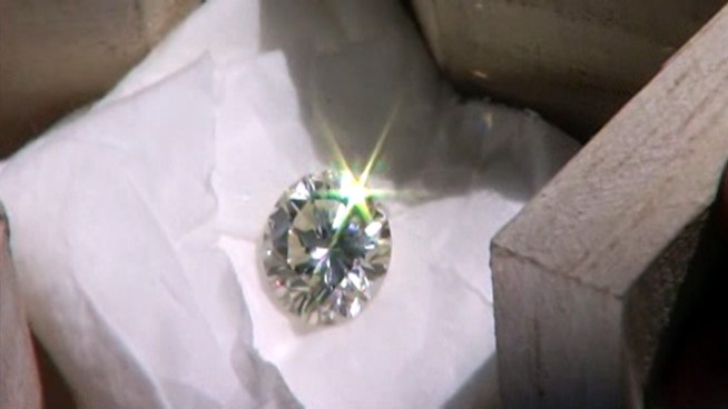 While looking for golf balls to hit around her backyard, 8 year old April Sanity found a diamond.  A real diamond.