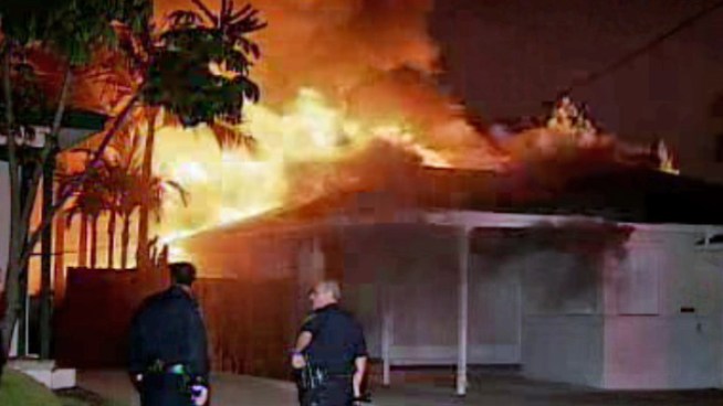An 88 year old woman made it out alive of a fully engulfed house fire in Allied Gardens Tuesday night