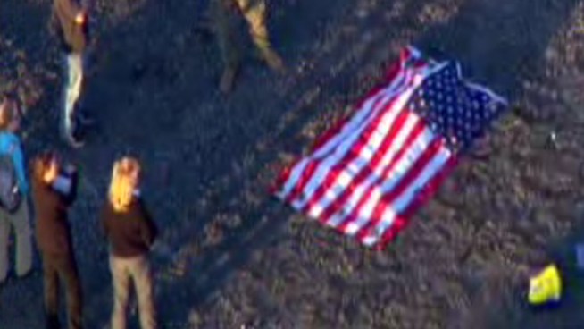 A Camp Pendleton marine was killed in a skydiving accident near the Perris Valley Airport Tuesday afternoon. A flag was draped over the Marine's body as it was taken from the scene. The circumstances surrounding the deadly accident were unknown. Jacob Rascon reports from Perris for the NBC4 News at 6 p.m. on Feb. 26, 2013.