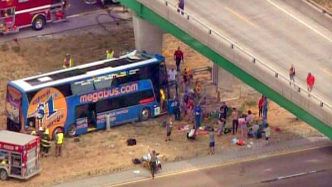 A double-decker Megabus was badly damaged after striking a pillar along Interstate 55 in southern Illinois. This video from a chopper above the scene shows first responders tending to the scene.