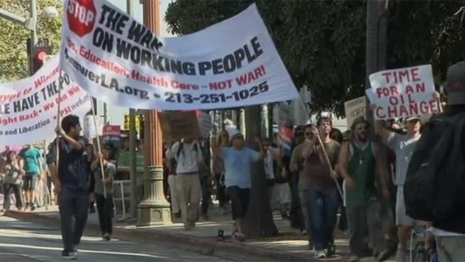Supporters of the Occupy Wall Street movement converged on LA's City Hall