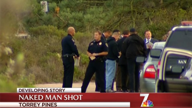 A naked man was shot at by a Park Ranger Thursday afternoon after he displayed what appeared to be a knife and machete.