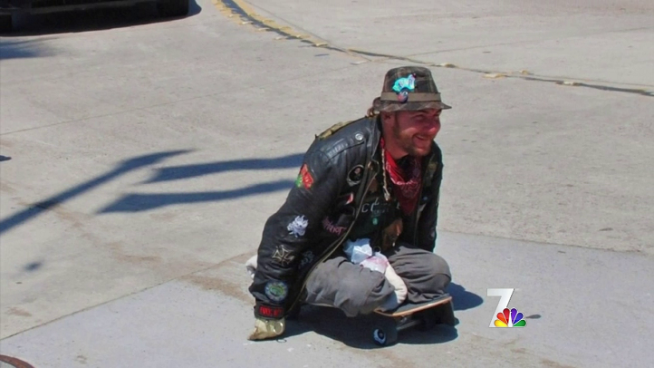 Friends of a paraplegic man who was injured while skateboarding hitched to a truck tell NBC 7 reporter Steven Luke that he found an interesting way to get around Ocean Beach.