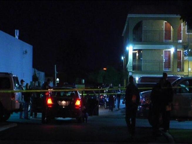 Authorities say two state parole agents shot and killed a parolee after he pointed a gun at them. 	It happened in the 93-hundred block of Kearny Villa Road at a <a title=