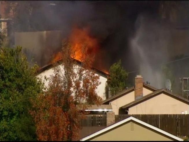 A man who lives next to the bomb house won't be going home just yet.