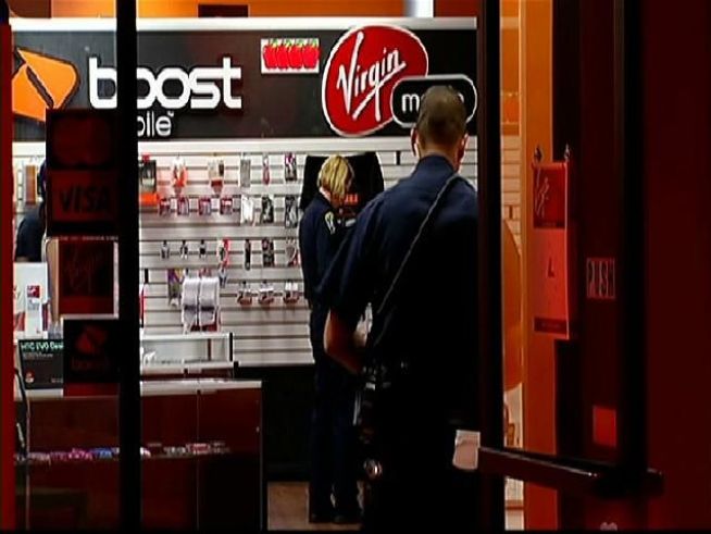 Four armed suspects robbed a Boost Mobile cell phone store in Clairemont Saturday night. A female employee was forced to the ground and tied up while the robbers stole her purse, car and more than $20,000 worth of store merchandise. NBC 7's Lea Sutton reports.