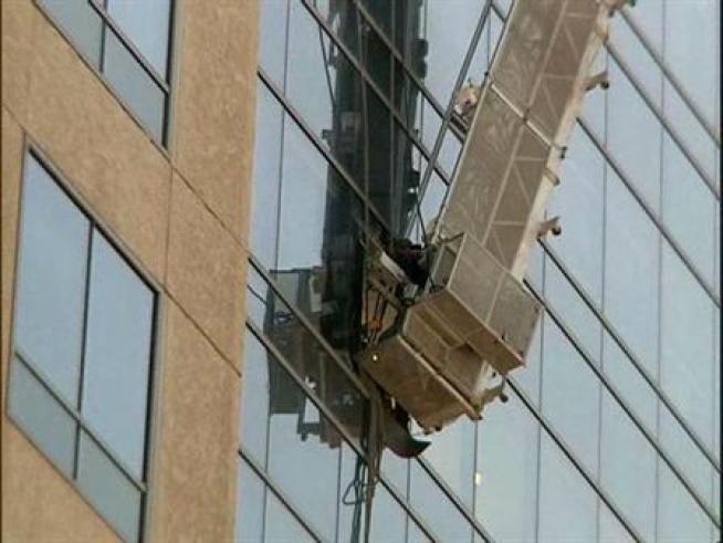A window washer stuck on a broken scaffold used the time waiting for firefighters to call his second job to tell them - uh - he was going to be a little late.