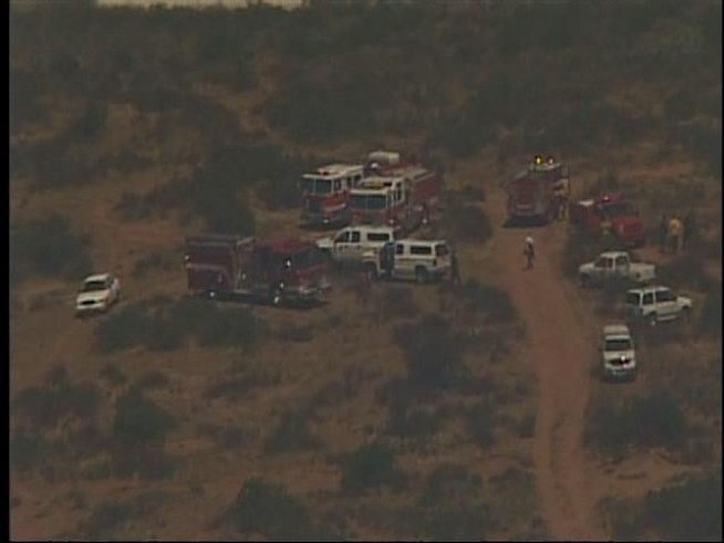 Raw aerials shot by a television news helicopter showing the fire burning near <a title=