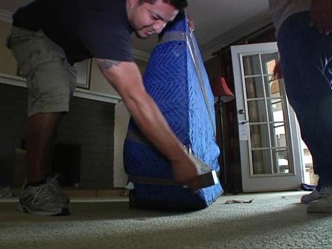 Neighbors closest to a house full of explosives are hoping for the best.