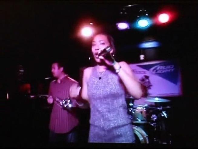 UPDATED: A pregnant musician was shot while sitting inside a parked car.