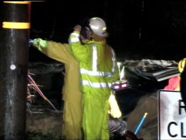 A couple was pulled from the rising water by swift water rescue crews Monday, Dec. 20 along De Luz Road in <a title=