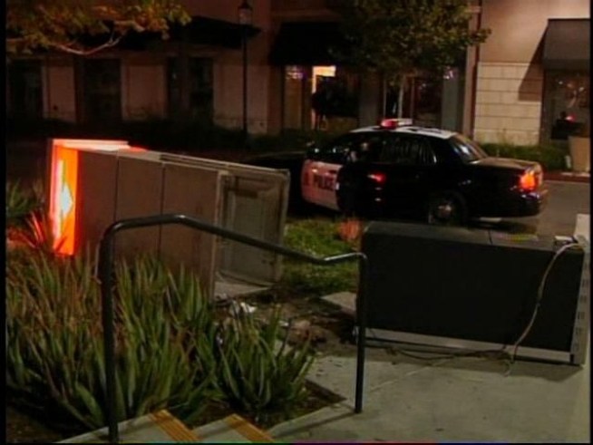 Just before 3 a.m. Friday, a dark blue/green semi-truck with lights along the top, minus the trailer, pulled up, backed into the ATM at the <a title=