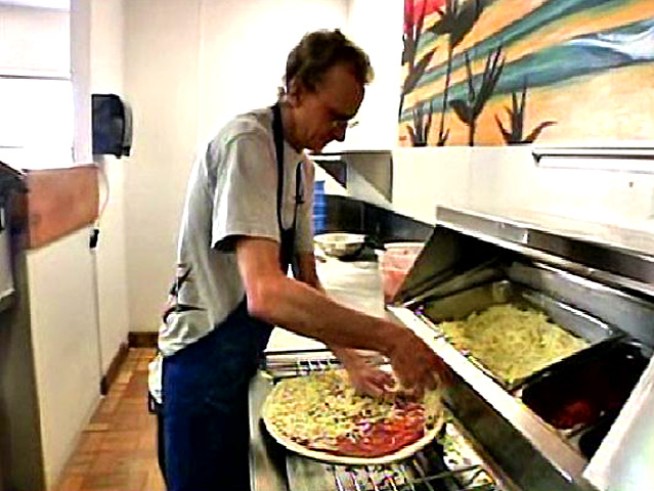After being maced, two men stop a suspect and deliver a pizza.