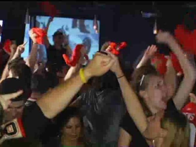 Fans in Wrigleyville, Navy Pier, Madison Street and throughout the city celebrate the Blackhawks first <a title=