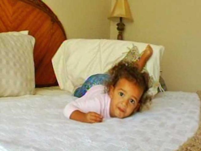 A court rules that a girl involved in a custody fight can remain in OC, for now.