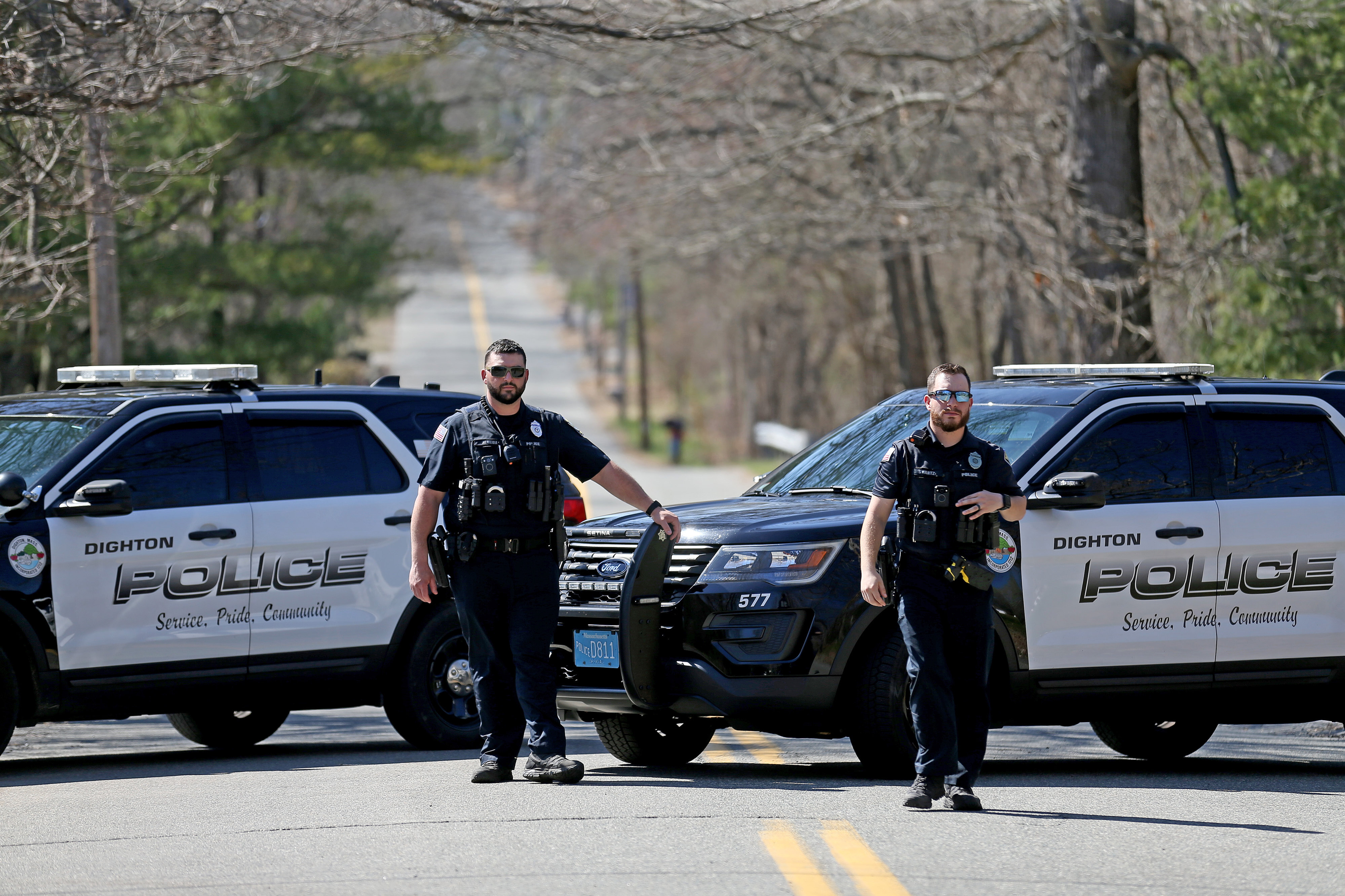 Police block Williams Street in Dighton, Massachusetts, as the FBI investigates the home of a 21-year-old member of the Massachusetts Air National Guard in connection with the disclosure of highly classified military documents on the Ukraine war on Thursday, April 13, 2023.
