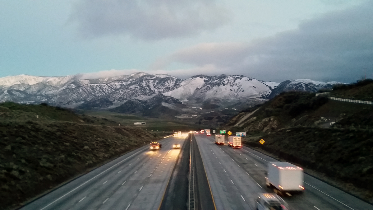 Snow caps the mountains north of Los Angeles after an early March 2016 storm.