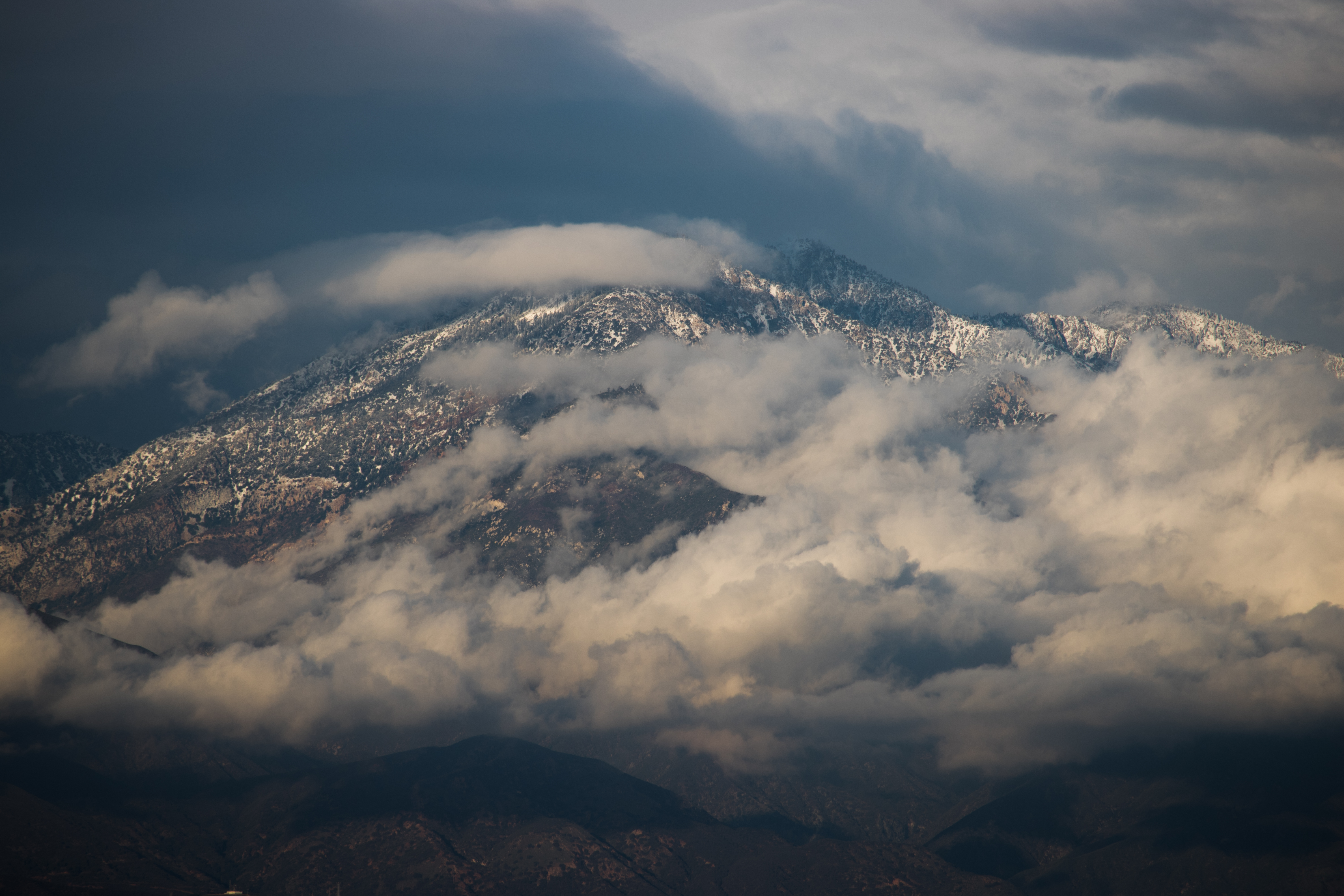 A view of snow in the mountains as seen looking north from La Habra Jan. 13, 2019.