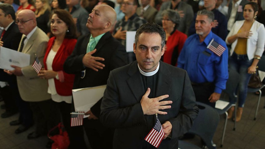 111116 naturalization ceremony somber