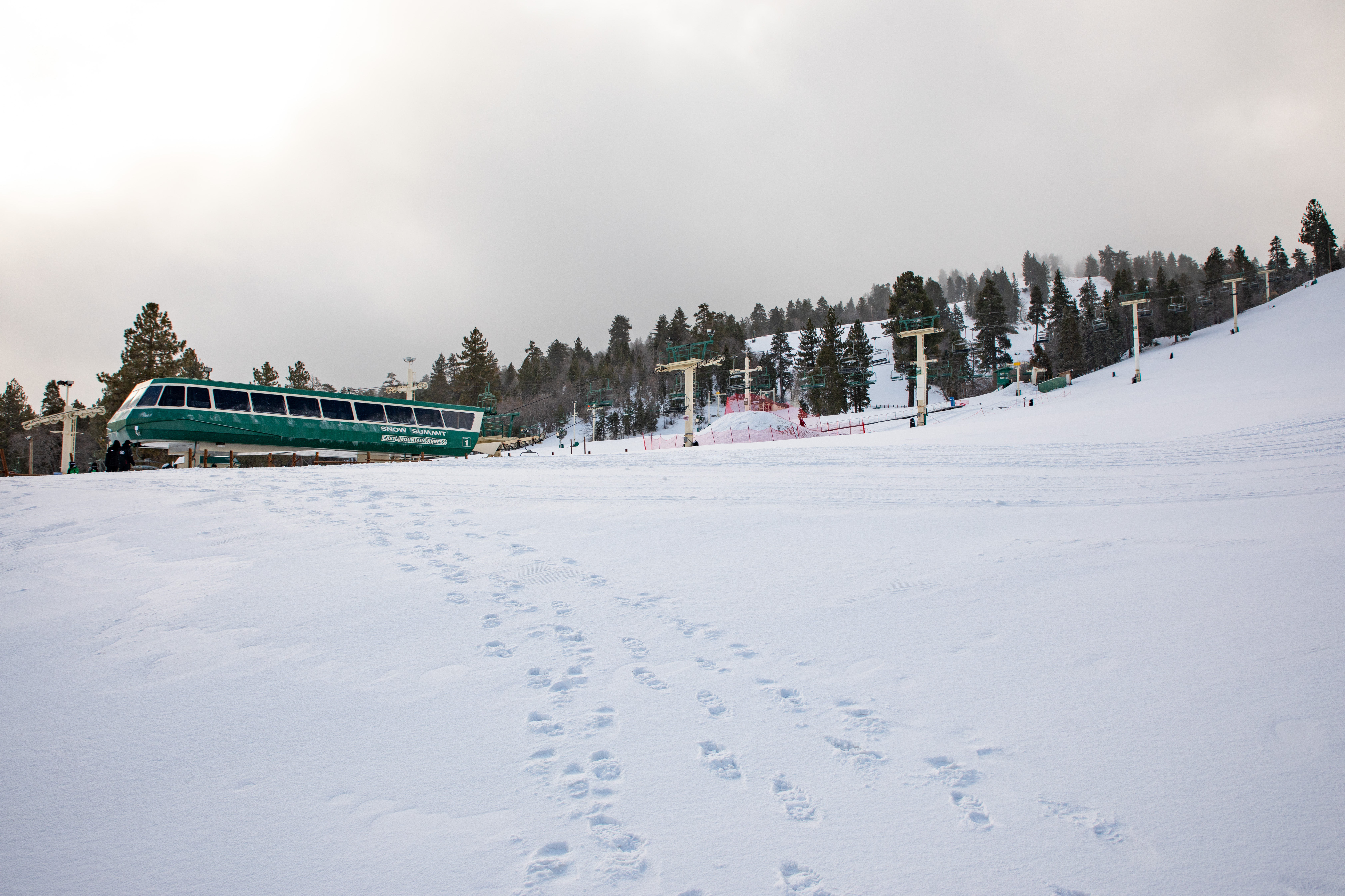 Footsteps appear in the snow in Big Bear in March 2019.