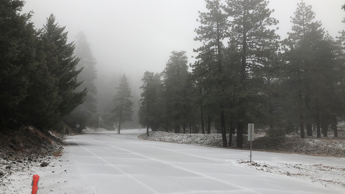 Caltrans asked drivers to use extra caution in mountain areas. Here is a view of snow covered roads in Mount Baldy on Wednesday. Nov. 20, 2019. 