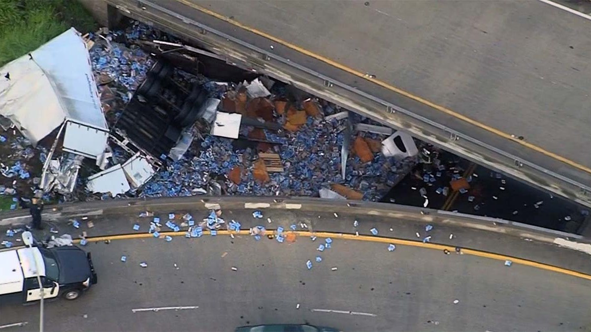 Beer Truck Crash Spills Boxes of Modelo on Freeway Overpass NBC 7 San
