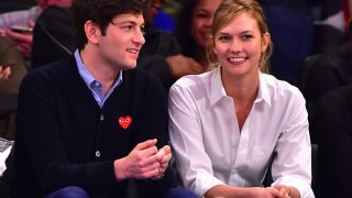 In this March 26, 2016, file photo, Joshua Kushner and Karlie Kloss attend the Cleveland Cavaliers vs New York Knicks game at Madison Square Garden in New York City.