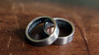 In this photo taken March 22, 2015, the rings of Thomas Kostura and Ijpe DeKoe sit on a table in their Memphis, Tennessee, apartment.