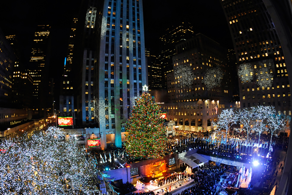 The 74-foot-tall Rockefeller Center Christmas Tree is lit using 30,000 energy-efficient LED lights in the 79th annual lighting ceremony, Nov. 30, 2011, in New York. 