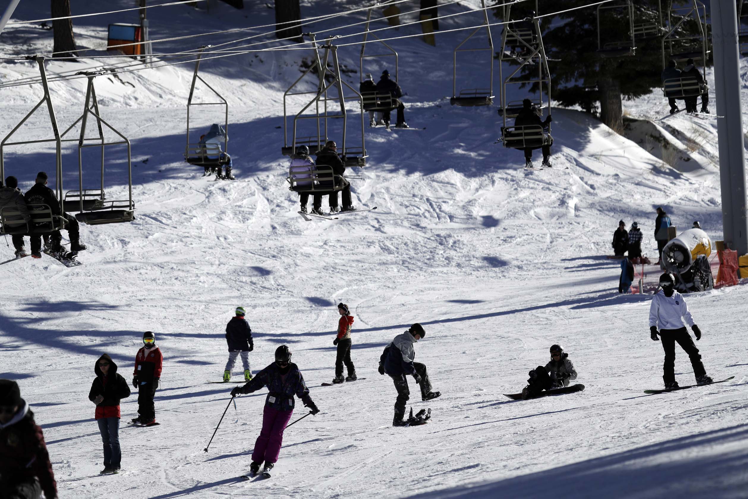 A crowd of skiers is seen Friday, Feb. 22, 2019, in Wrightwood, Calif. A winter storm swept through the Southwest and brought a rare snowfall to the Las Vegas Strip and the mountains above Malibu in California. (AP Photo/Marcio Jose Sanchez)