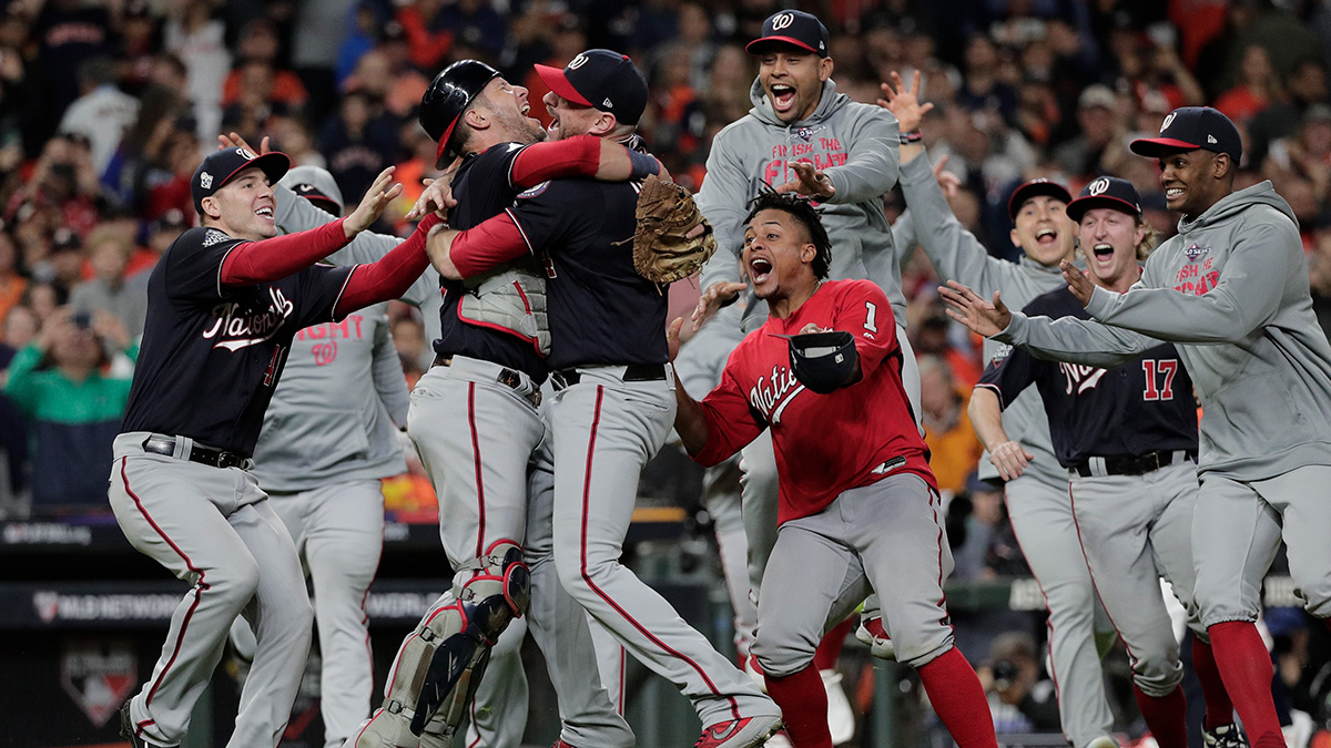 Washington Nationals' Yan Gomes and Daniel Hudson celebrate after Game 7 of the baseball World Series against the Houston Astros Wednesday, Oct. 30, 2019, in Houston. The Nationals won 6-2 to win the series.
