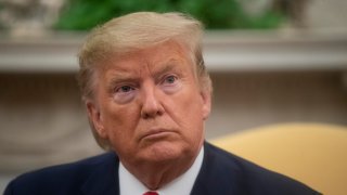 President Donald Trump listens to a question during a meeting with Greek Prime Minister Kyriakos Mitsotakis in the Oval Office of the White House, Tuesday, Jan. 7, 2020, in Washington.